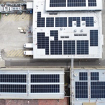 Solar panels spread across three roofs at the Central Production Unit at Repat